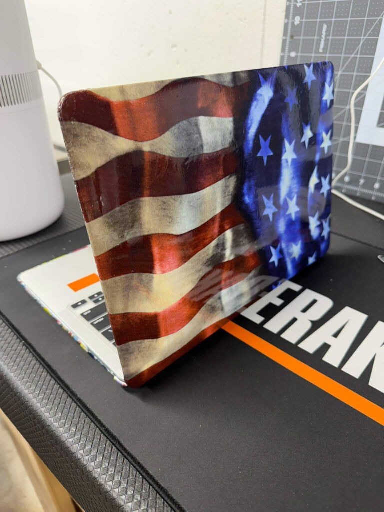 Flat panel finished in a distressed American flag hydrographic film